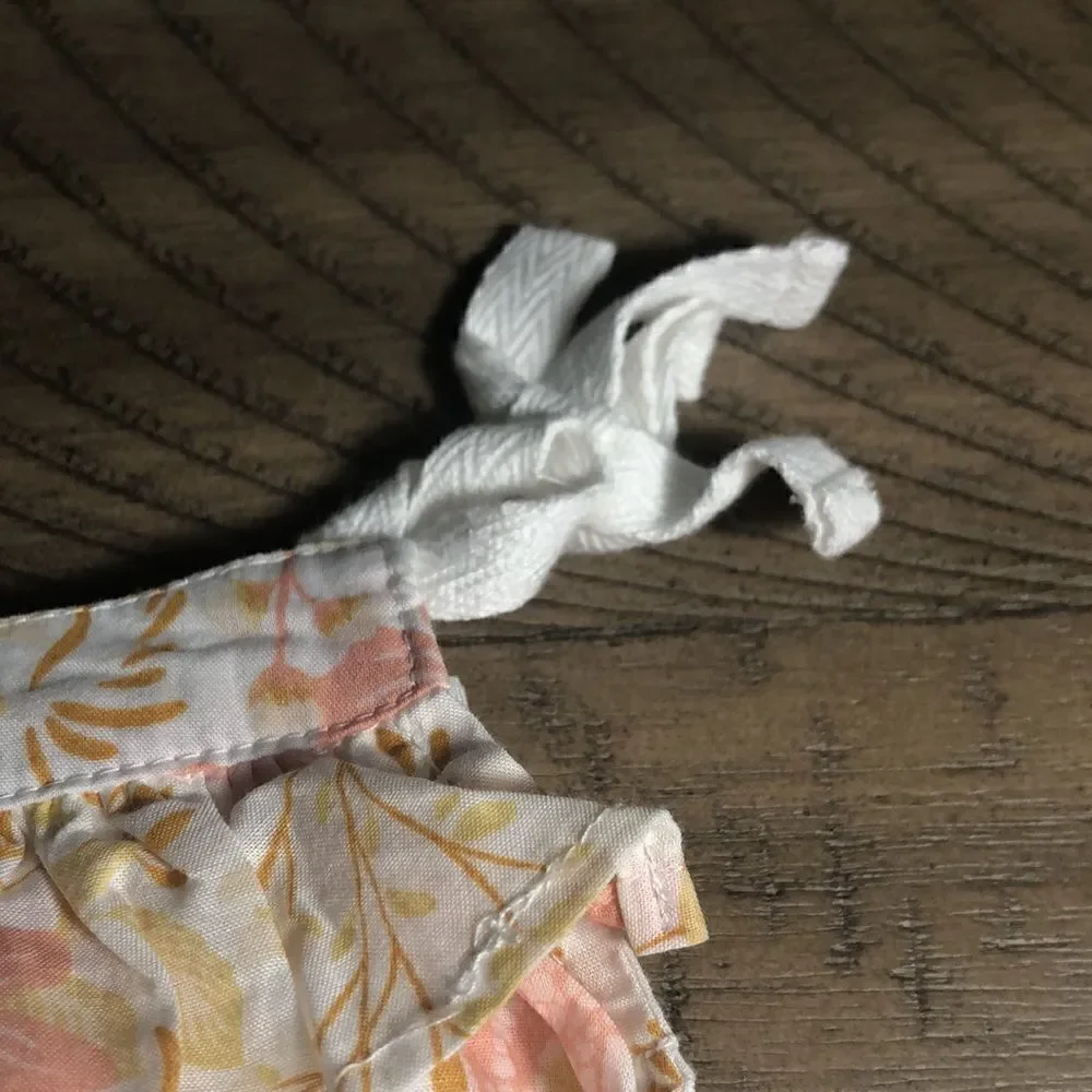 NWT Organic Cotton Floral Ruffle 3 snap Romper. Soft! 0-3 months.